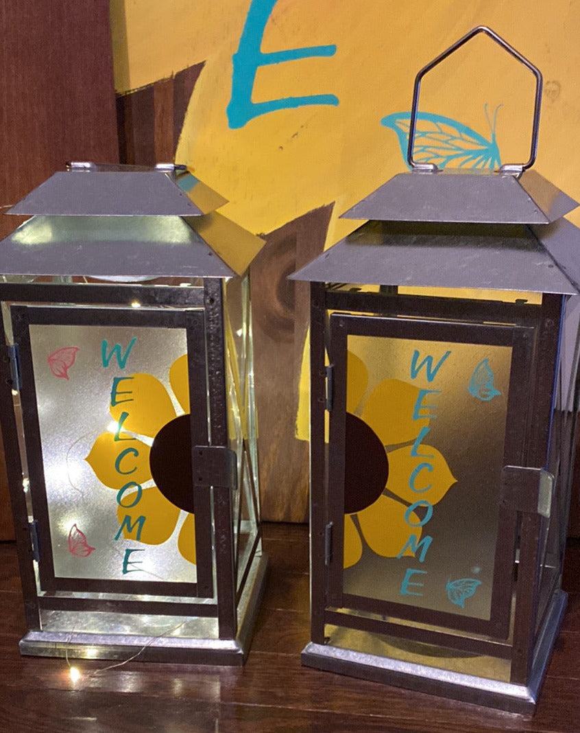 Decorated lanterns with vinyl text and led light